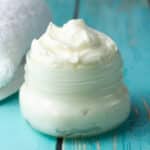 lotion in glass jar.