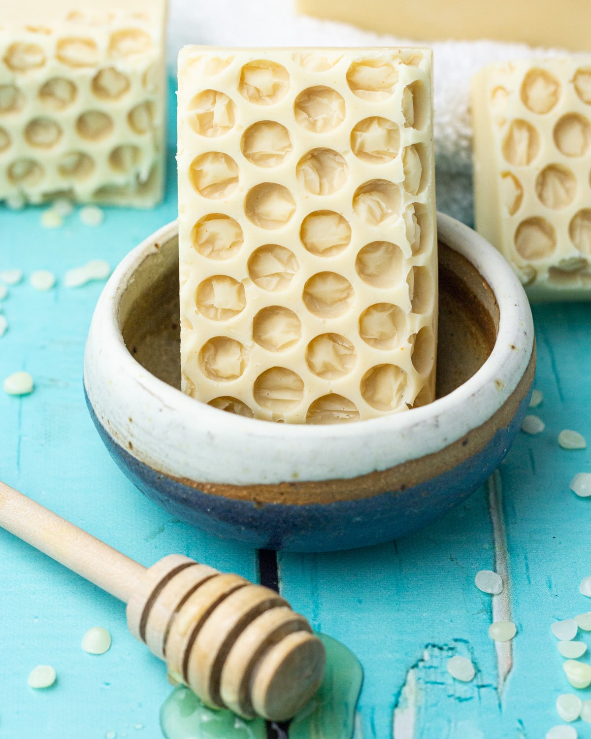 beeswax soap in soap dish.